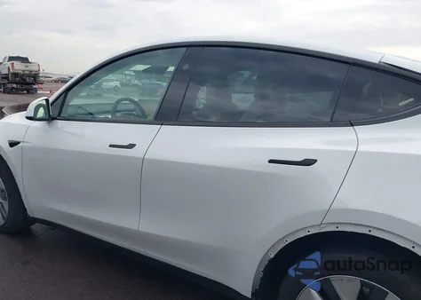 2023 Tesla Model Y Awd/Long Range Dual Motor All-Wheel Drive z USA, uszkodzony, nr VIN 7SAYGDEE9PA145270